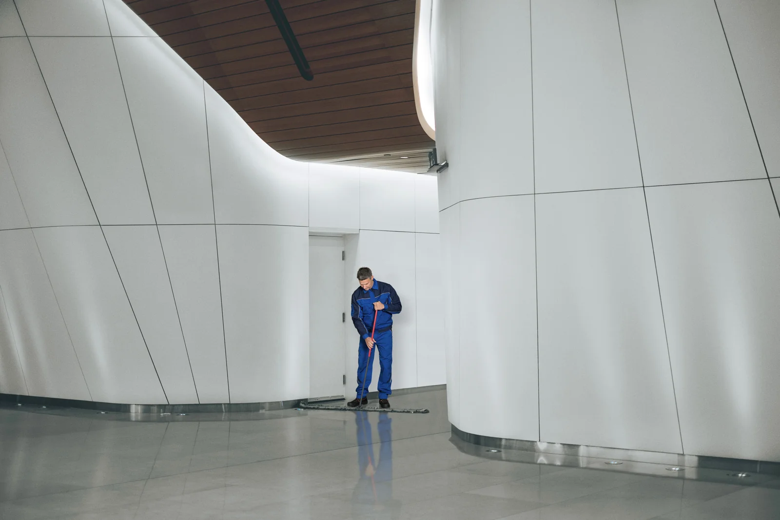 Cleaning professional caring for a bright, modern office