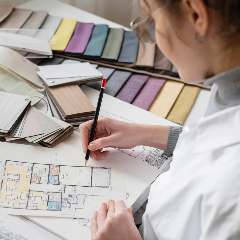 Designer planning an interior with material samples